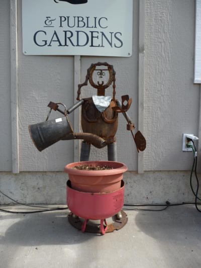 Ron Smith's recycled metal Watering Girl Planter